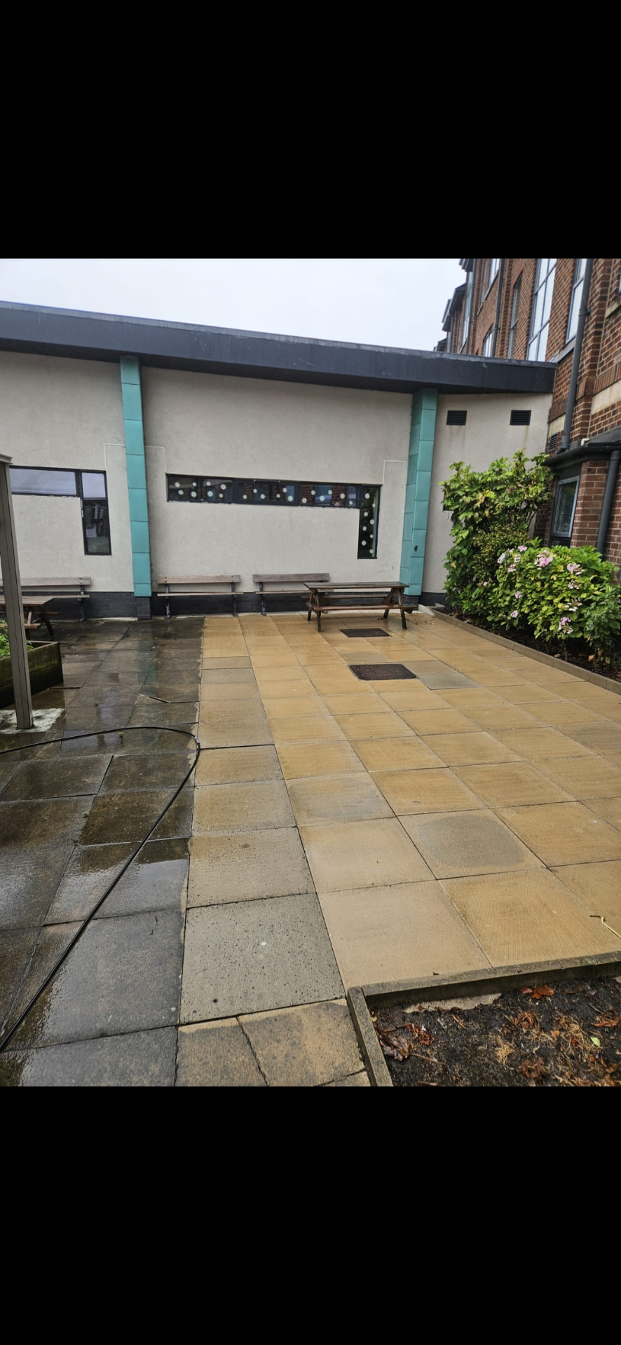 Clean commercial courtyard paving after pressure washing
