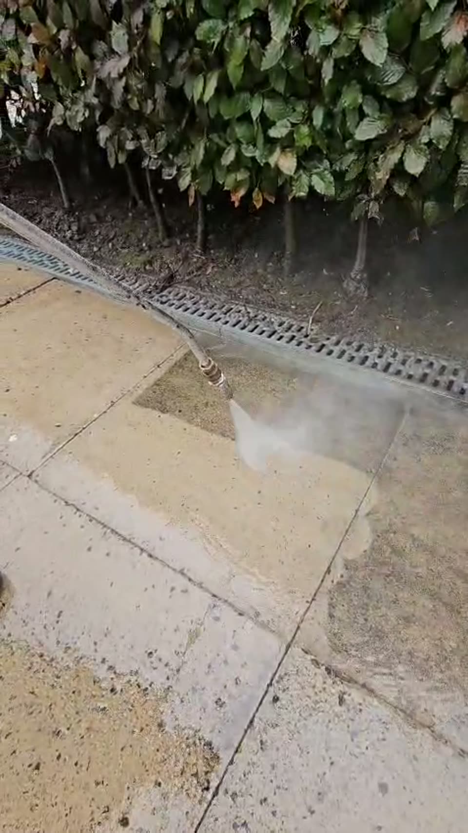 Patio being pressure washed on site